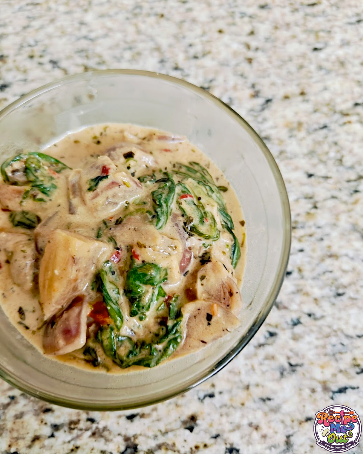 Creamy spinach Alfredo served in a glass bowl