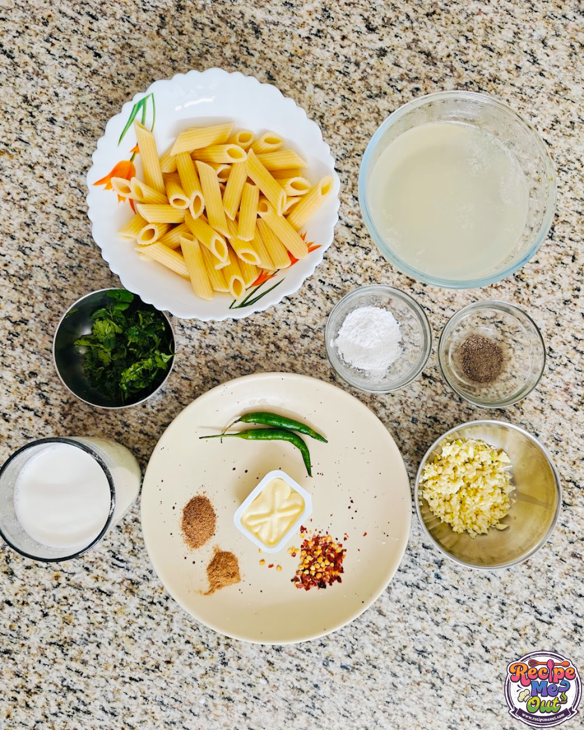 Ingredients for butter garlic cilantro pasta arranged on counter: penne pasta, chopped cilantro, butter, milk, garlic, green chilies, salt, pepper, chili flakes, and spices.
