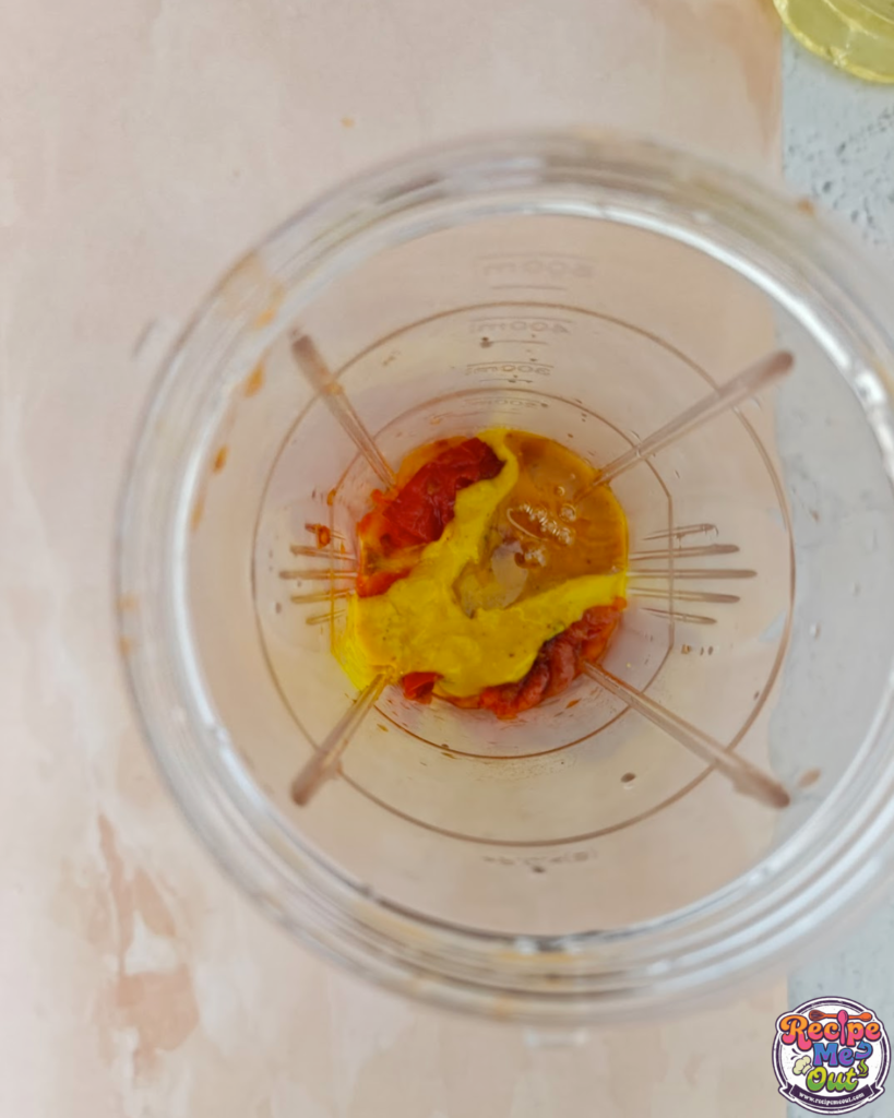 Honey added to blender with cooked tomatoes