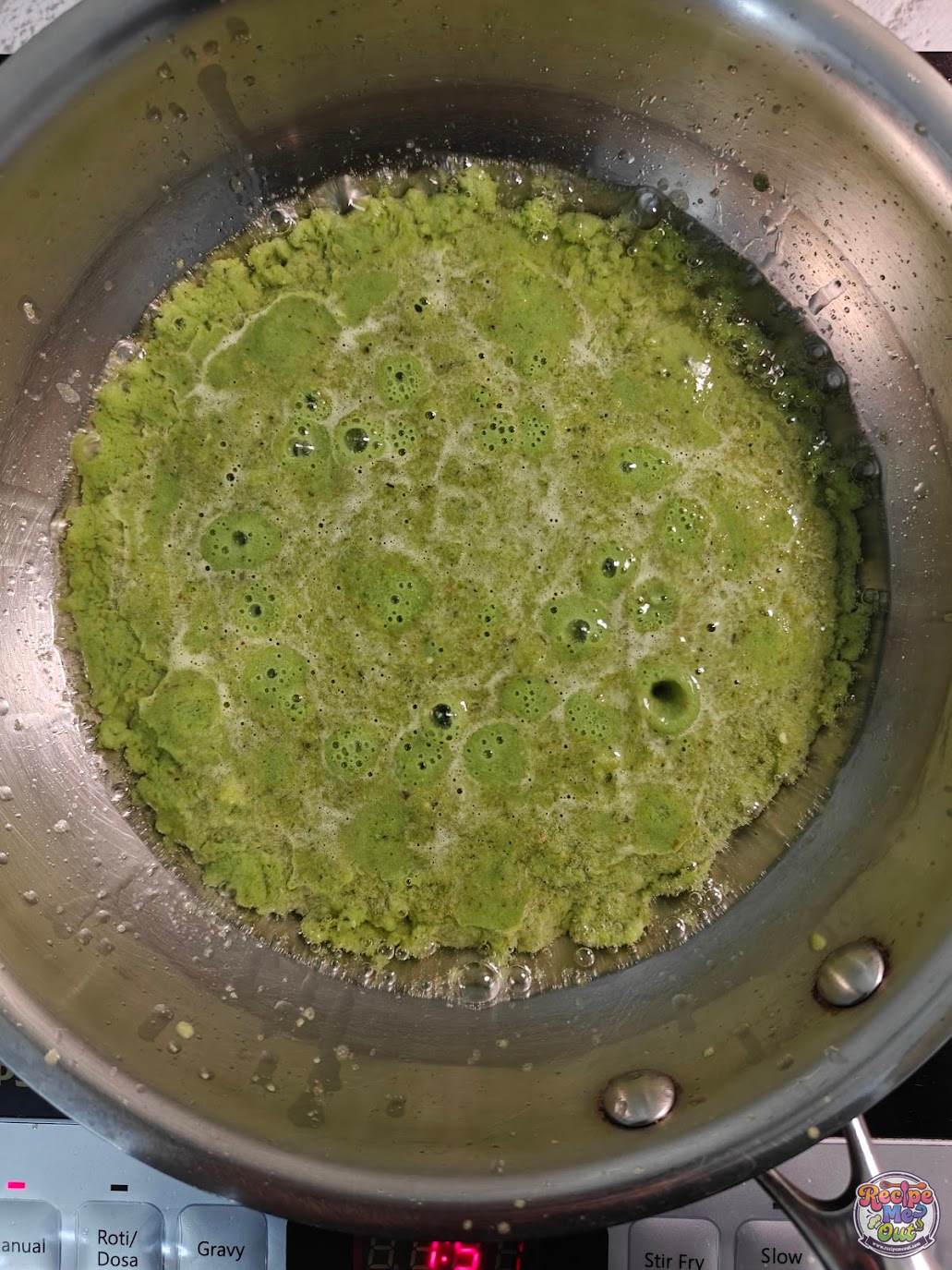 Green peas paste cooking in a pan with oil for Green Peas Pasta sauce