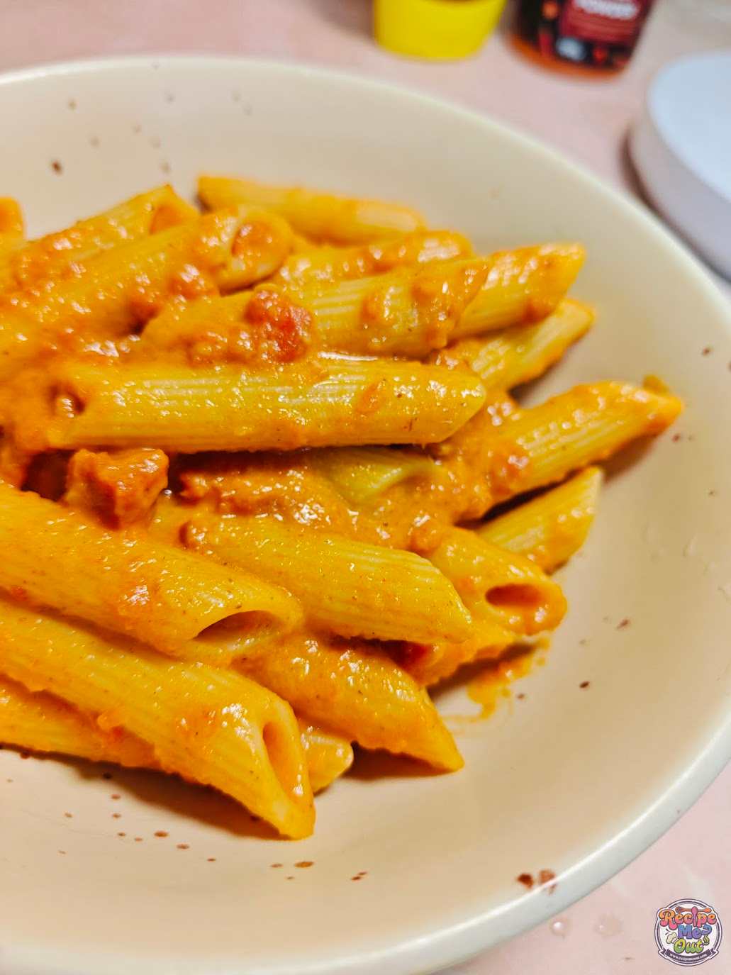 Creamy carrot sauce pasta served in a bowl with penne coated in a rich orange carrot-based sauce.
