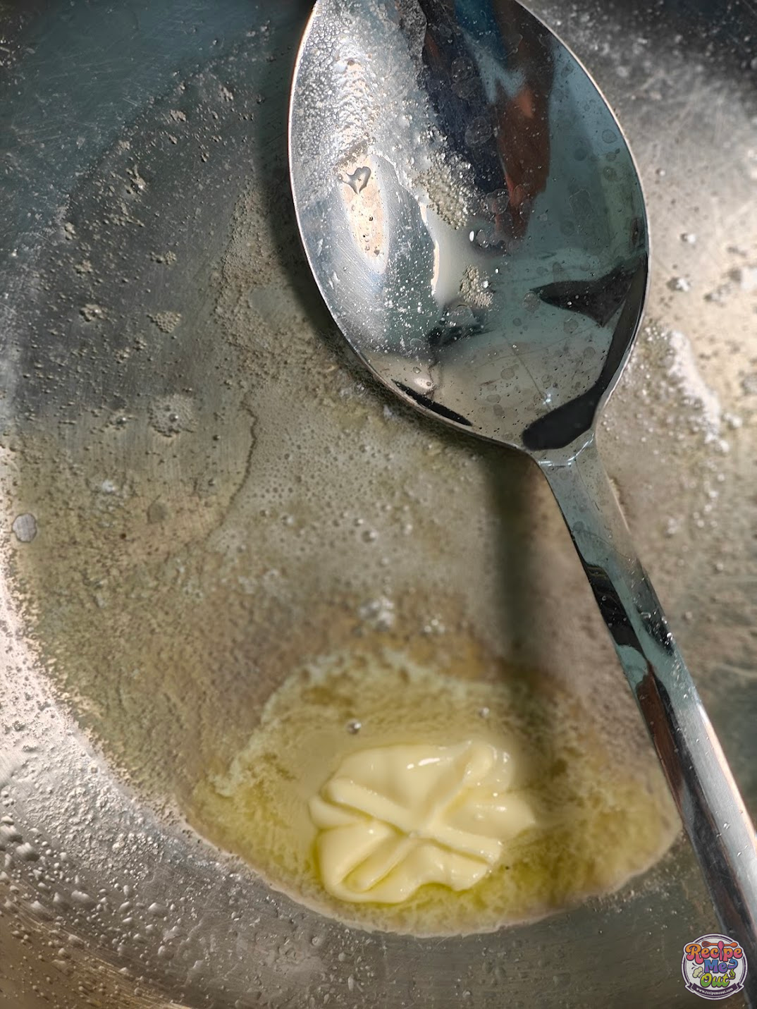 Butter melting in a pan along with the olive oil to start the pasta sauce base