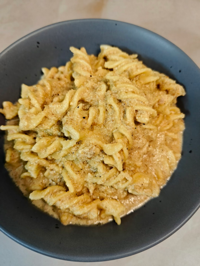 walnut pasta on a grey bowl