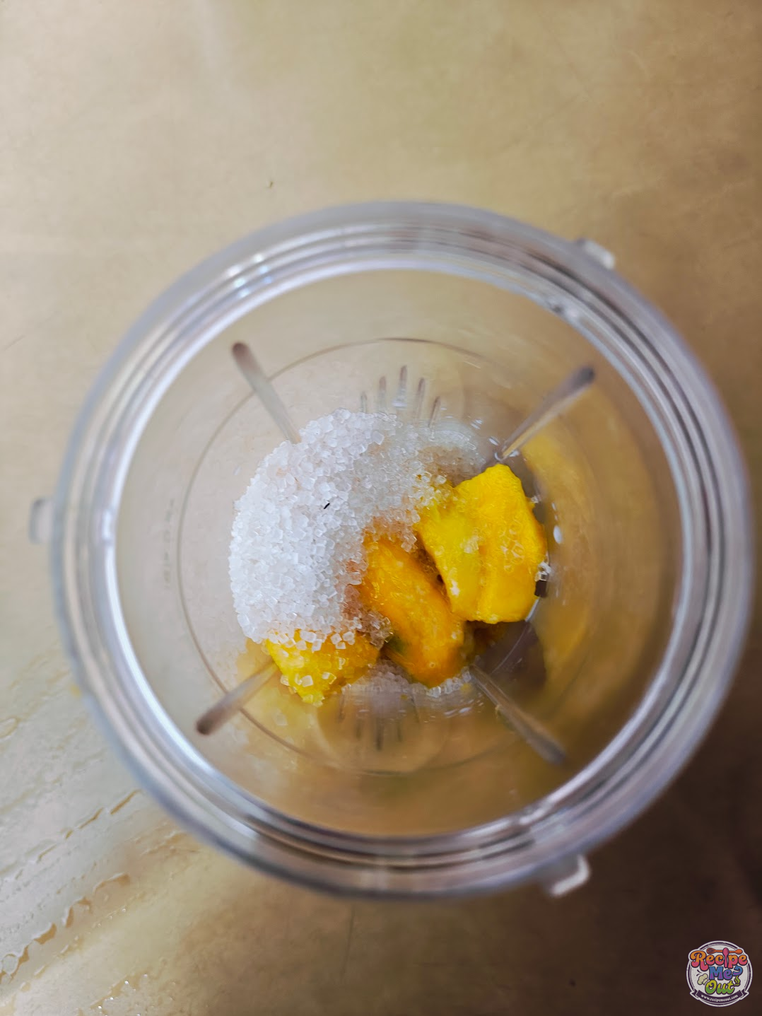 Sugar Added to the Blender after mango chunks are already added