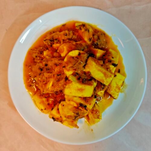 Overhead shot of Paneer Masala on a White Plate