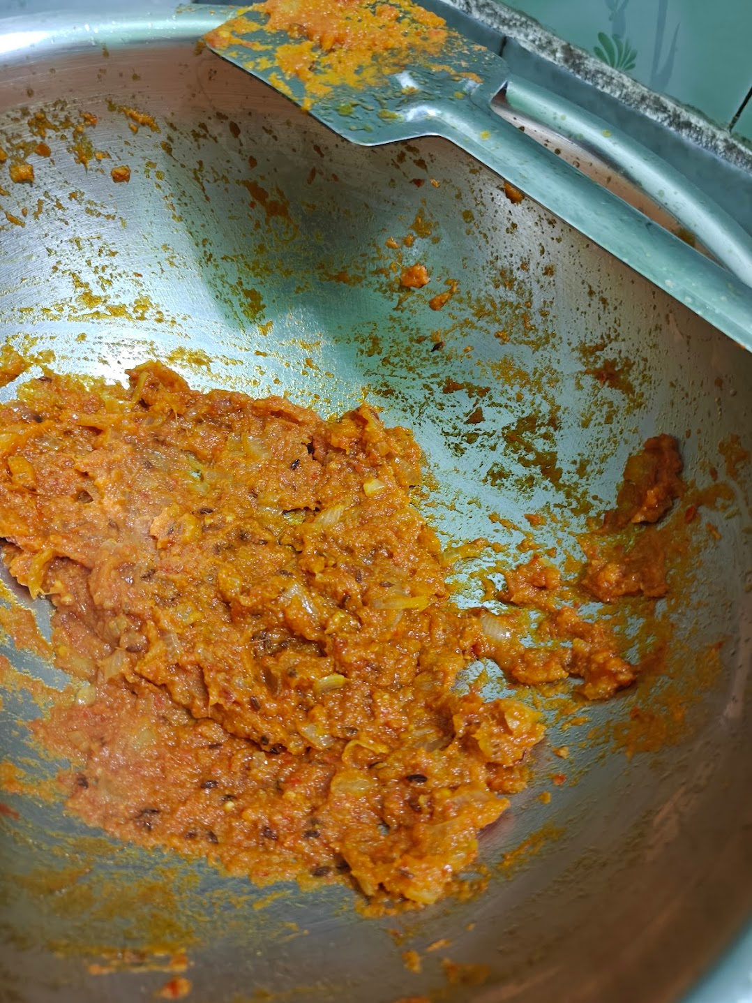 Thick onion tomato masala cooked with spices for paneer masala.