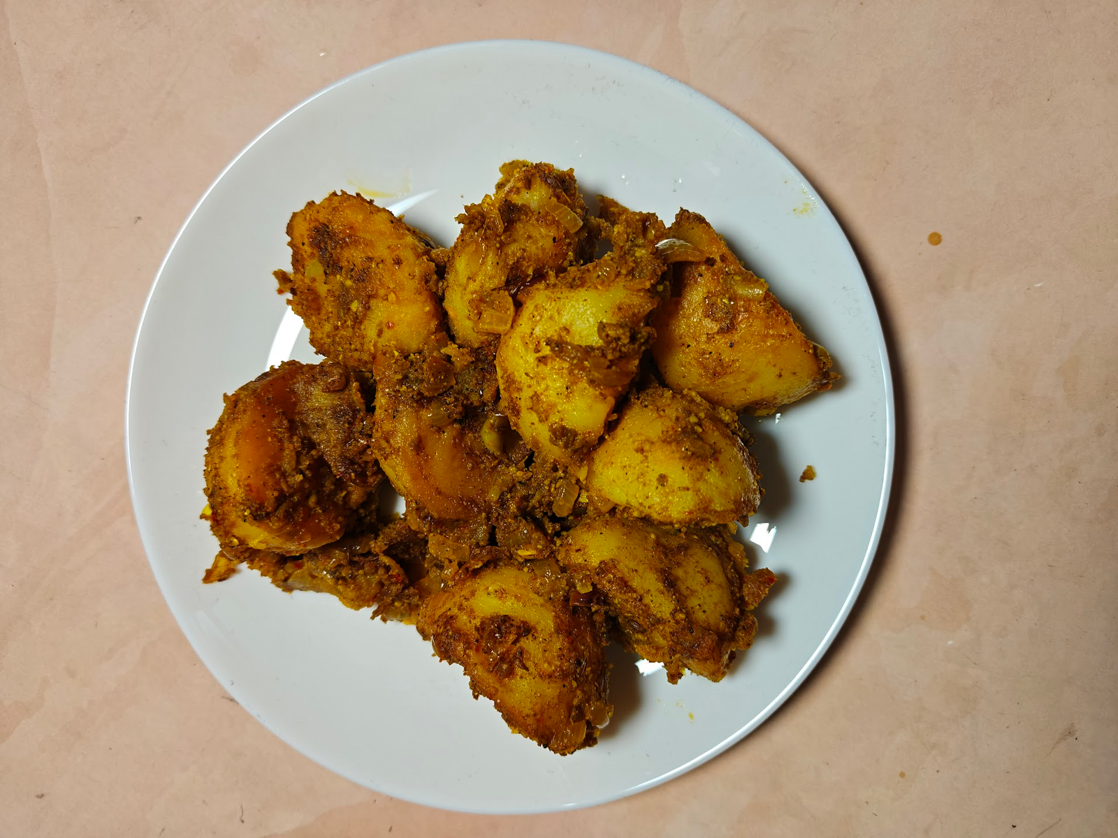 Achari Aloo (Pickled Potatoes) on a White Plate